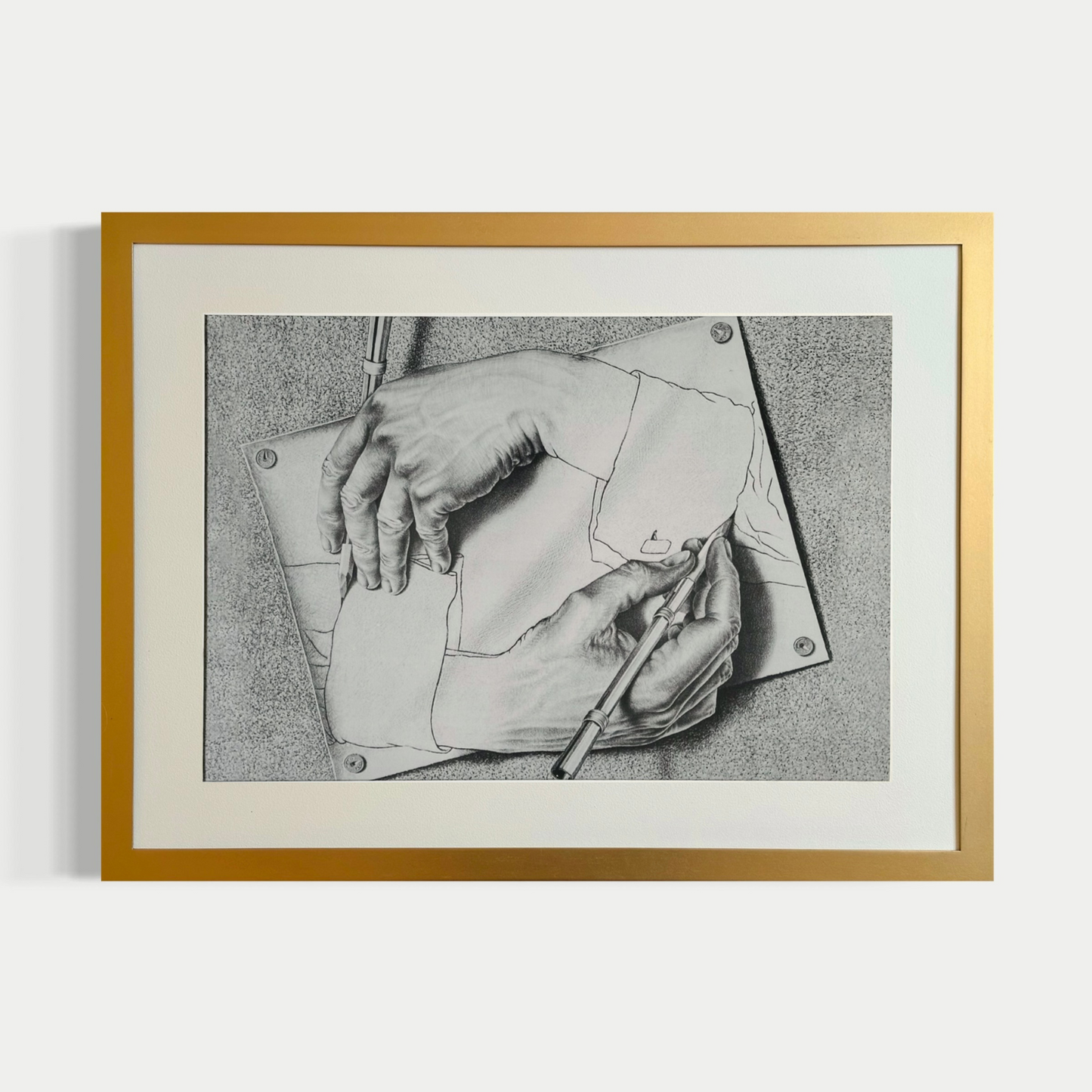 Manos dibujantes - M.C Escher