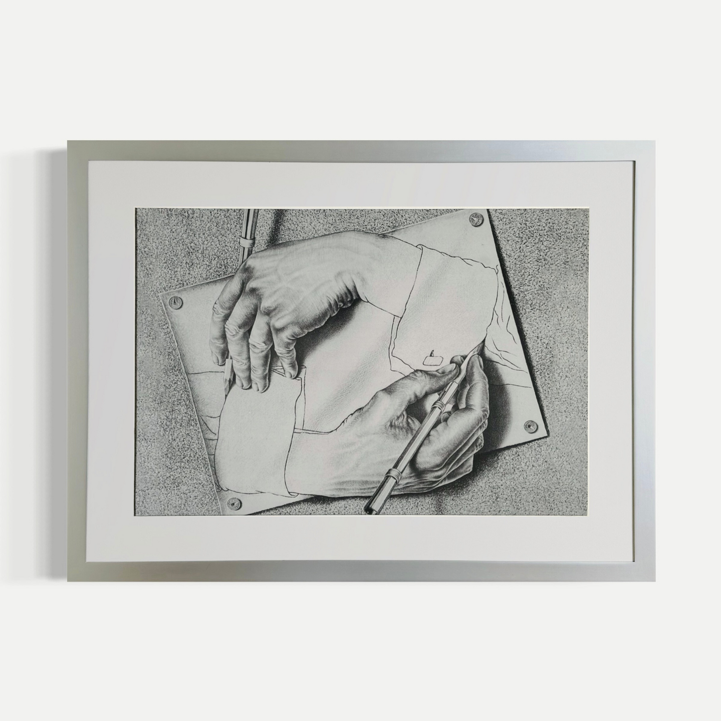 Manos dibujantes - M.C Escher