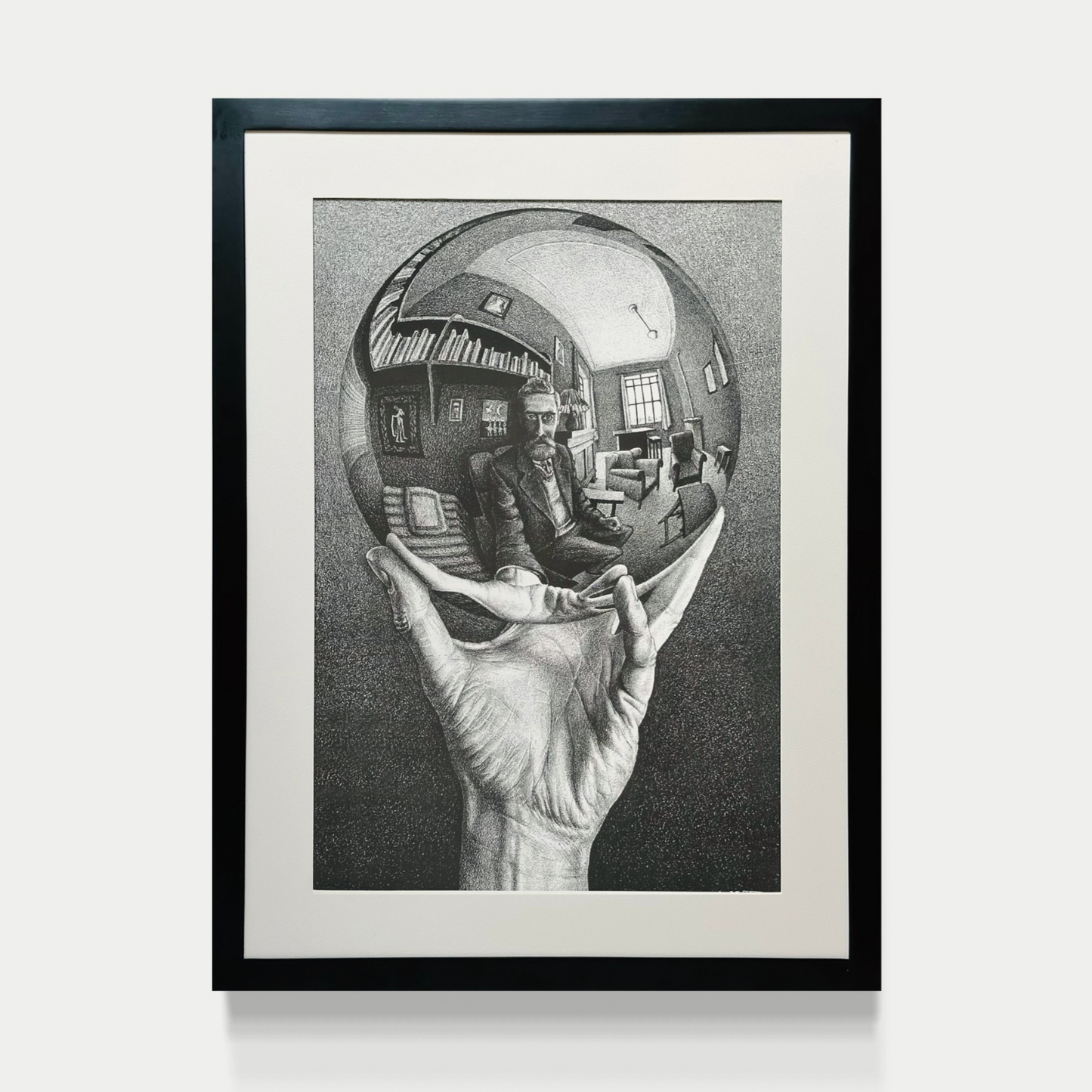 Mano con esfera reflectante - M.C Escher